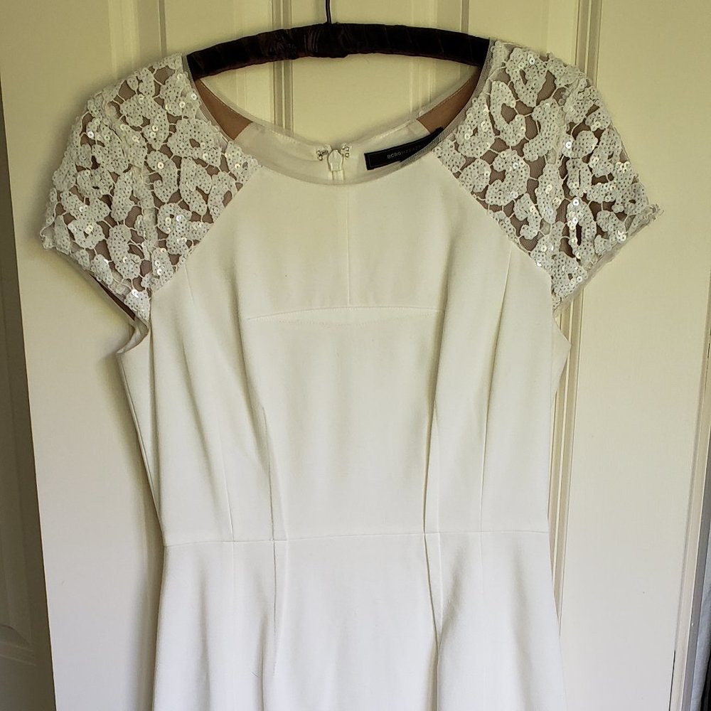 White BCBG dress with white sequined shoulders